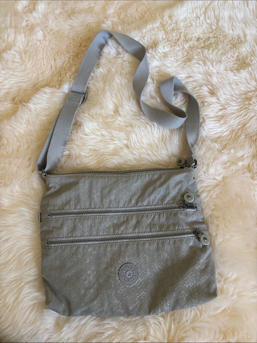 Kipling Light Gray Crossbody Bag with Multiple Zips